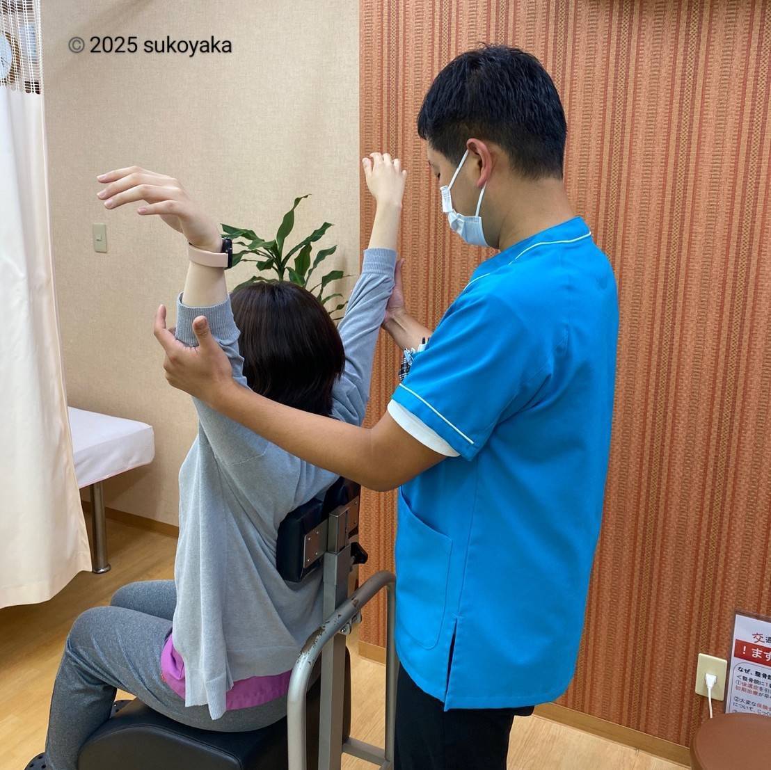 施術前チェックの様子の写真